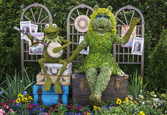 Topiaries of Kermit the Frog and Miss Piggy, inspired by the "Muppets Most Wanted" movie, delight guests near the Italy pavilion during the Epcot International Flower & Garden Festival at Walt Disney World Resort. Guests can see dozens of Disney character topiaries, millions of colorful blooms and themed gardens during the festival. (Matt Stroshane, photographer)
